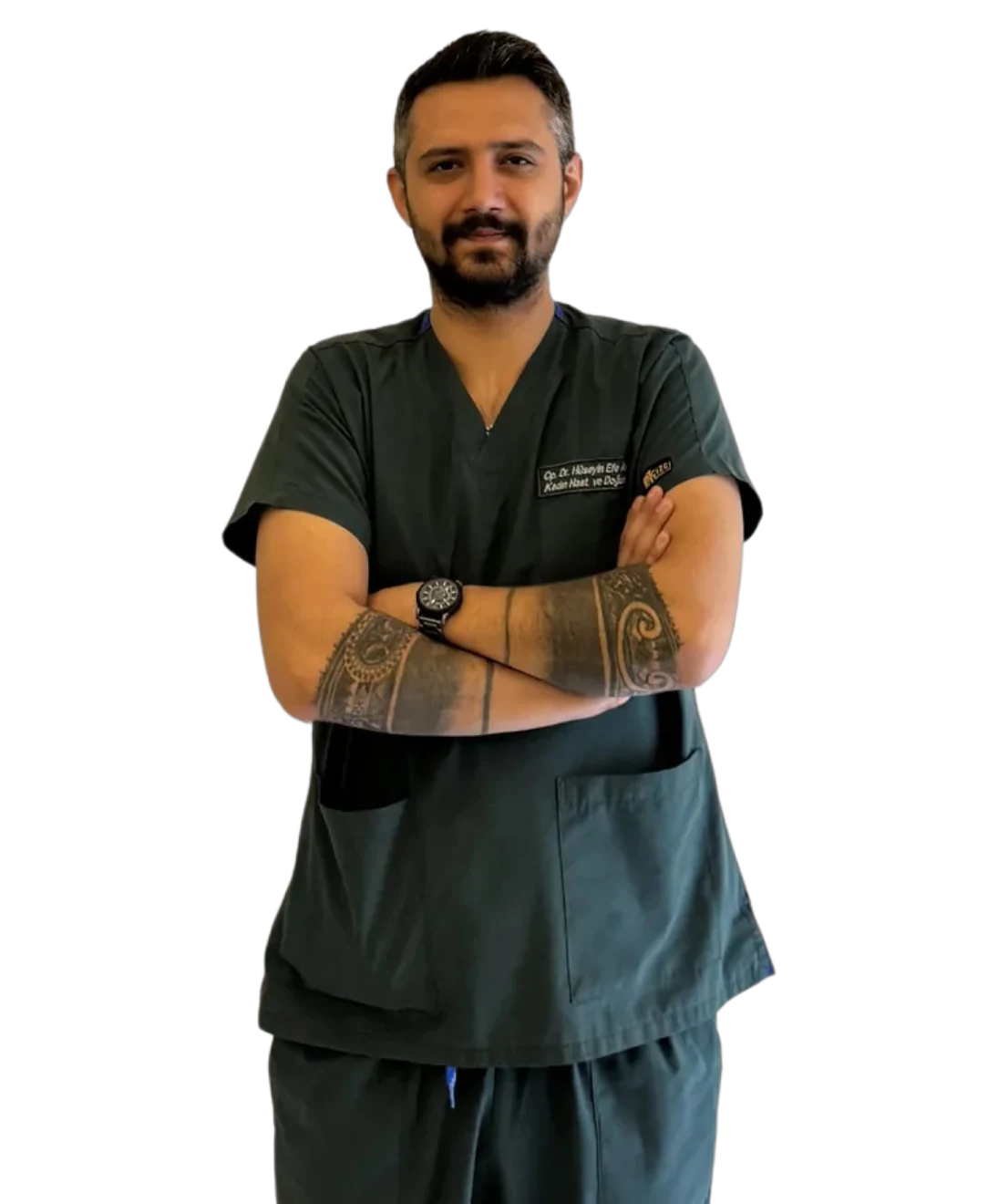Op. Dr. Hüseyin Efe Akalın with arms crossed, in surgical scrubs